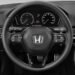 An image showing the car steering of a 2022 Honda Civic.