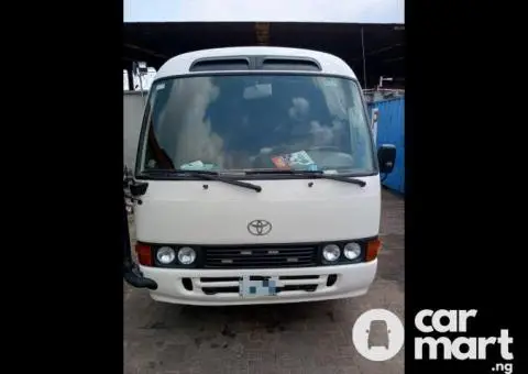 Toyota Coaster Bus for rental services - 2/5