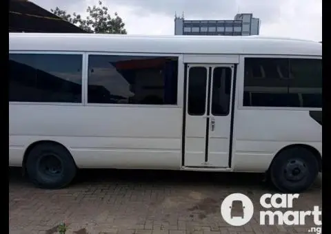 Toyota Coaster Bus for rental services - 4/5