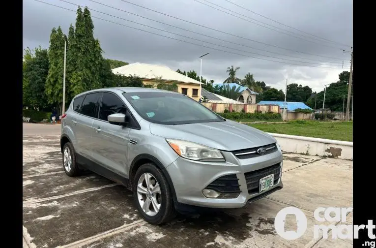 WAS BOUGHT BRAND NEW 2013 FORD ESCAPE - 2/5