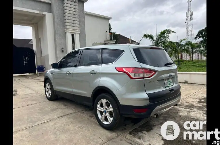 WAS BOUGHT BRAND NEW 2013 FORD ESCAPE - 5/5