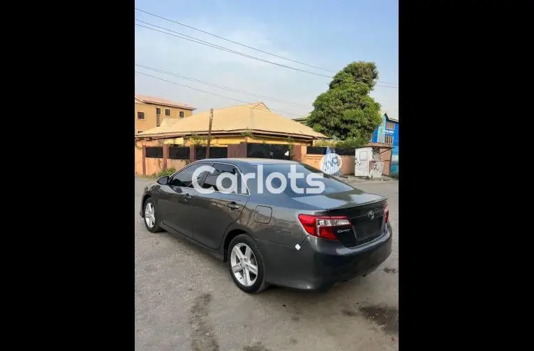 Registered but barely driven 2013 Toyota Camry SE - 4/5