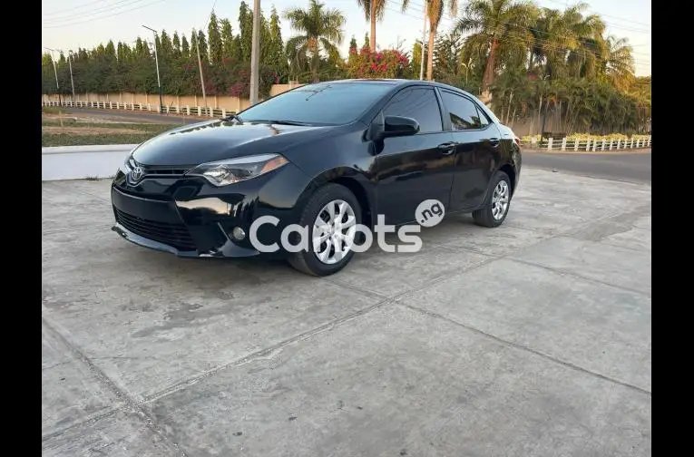 SUPER CLEAN 2015 TOYOTA COROLLA LE for sale in Kaduna