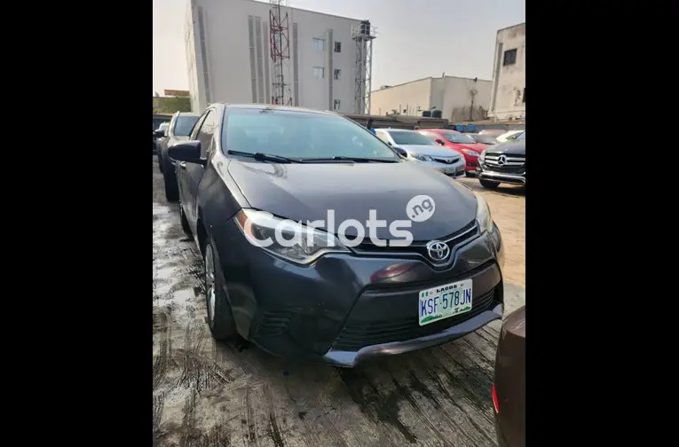 Registered 2014 Toyota corolla LE - 1/4