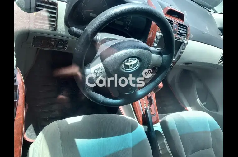 Nigerian Used 2013 TOYOTA COROLLA LE for sale in Kaduna - photo 2 of 5