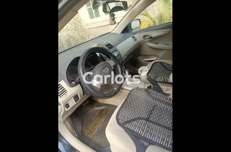 Distress sales REGISTERED 2012 TOYOTA COROLLA for sale in Abuja, FCT - photo 3 of 5