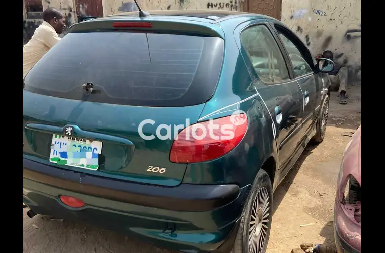 Distress sales Automatic Peugeot 206 with, pano, untampered engine and gear for sale in Abuja