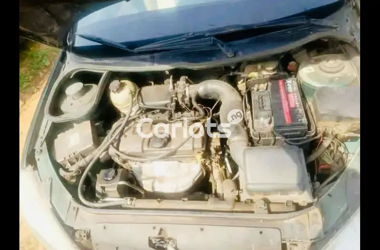 Nigerian Used Distress sales Automatic Peugeot 206 with, pano, untampered engine and gear for sale in Abuja, FCT - photo 4 of 5