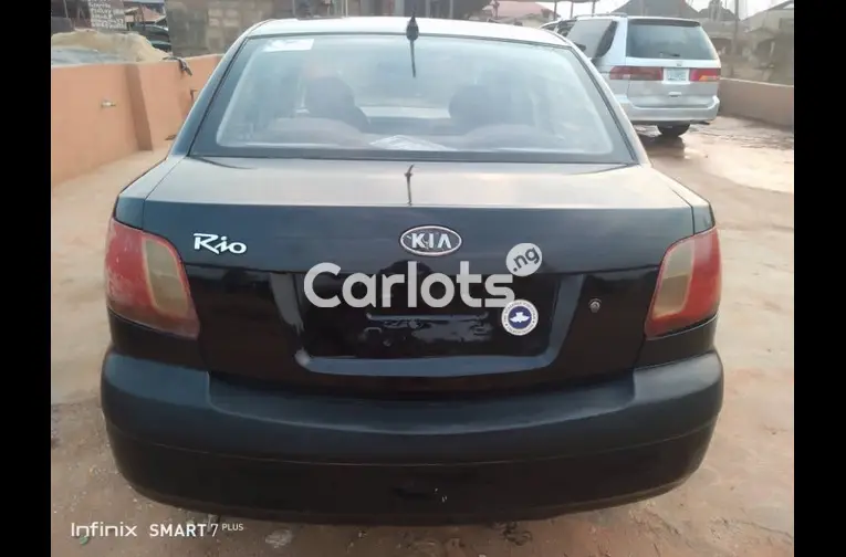 Registered 2010 KIA Rio - 4/5