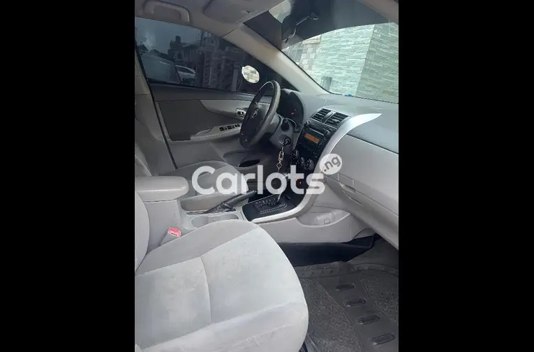 Nigerian Used CLEAN 2010 TOYOTA COROLLA for sale in Amuwo Odofin, Lagos - photo 2 of 5