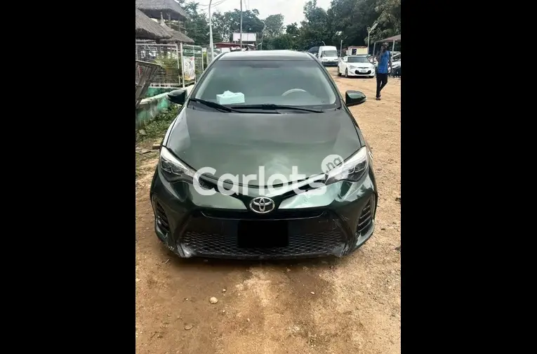 Nigerian Used 2014 TOYOTA COROLLA for sale in Abuja, FCT - photo 1 of 5