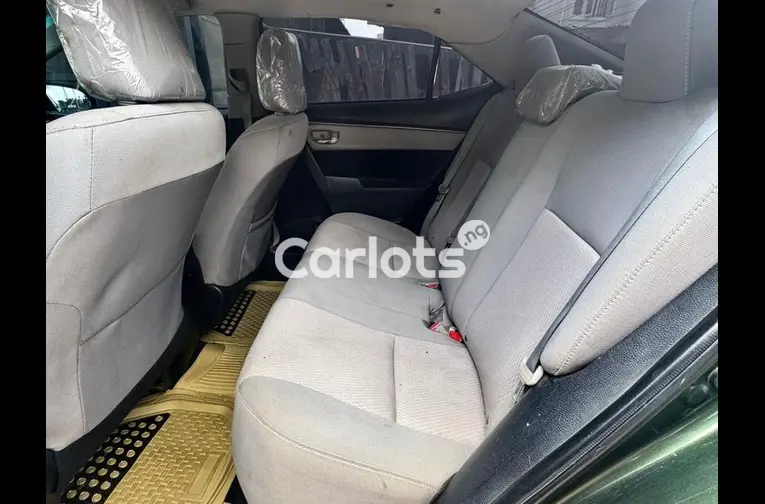 Nigerian Used 2014 TOYOTA COROLLA for sale in Abuja, FCT - photo 3 of 5