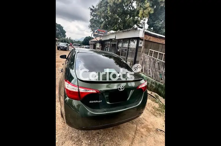Nigerian Used 2014 TOYOTA COROLLA for sale in Abuja, FCT - photo 5 of 5
