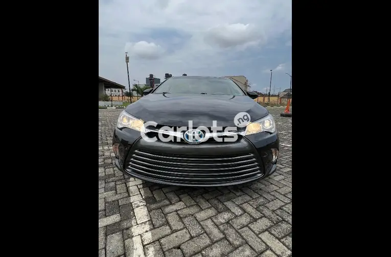 FOREIGN USED 2015 TOYOTA CAMRY HYBRID LE for sale in Isheri-Olofin