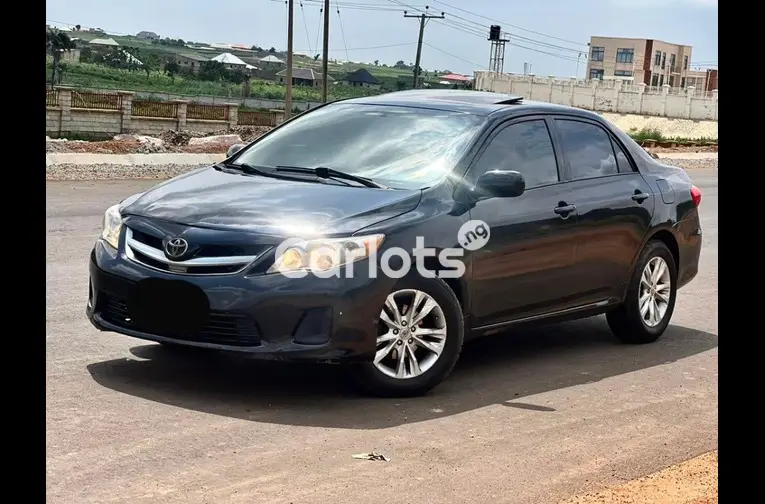 Nigerian Used 2012 TOYOTA COROLLA for sale in Abuja, FCT - photo 1 of 5