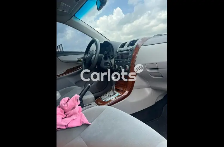 Nigerian Used 2012 TOYOTA COROLLA for sale in Abuja, FCT - photo 2 of 5