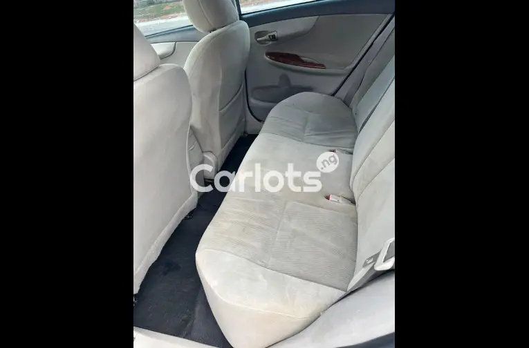 Nigerian Used 2012 TOYOTA COROLLA for sale in Abuja, FCT - photo 4 of 5