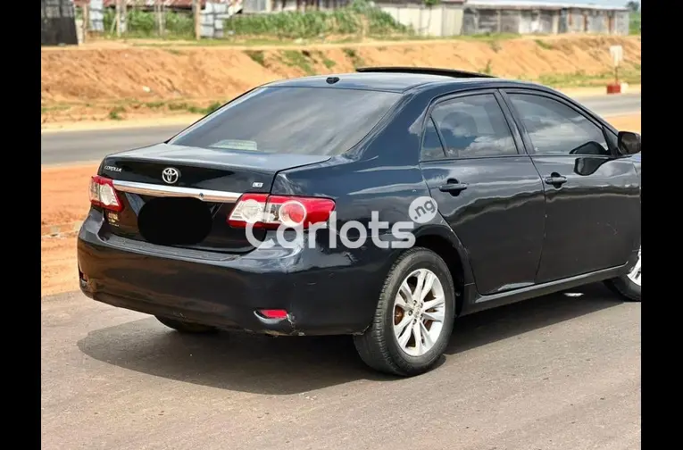 Nigerian Used 2012 TOYOTA COROLLA for sale in Abuja, FCT - photo 5 of 5