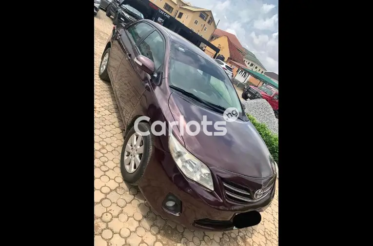 Nigerian Used 2011 TOYOTA COROLLA for sale in Abuja, FCT - photo 2 of 5
