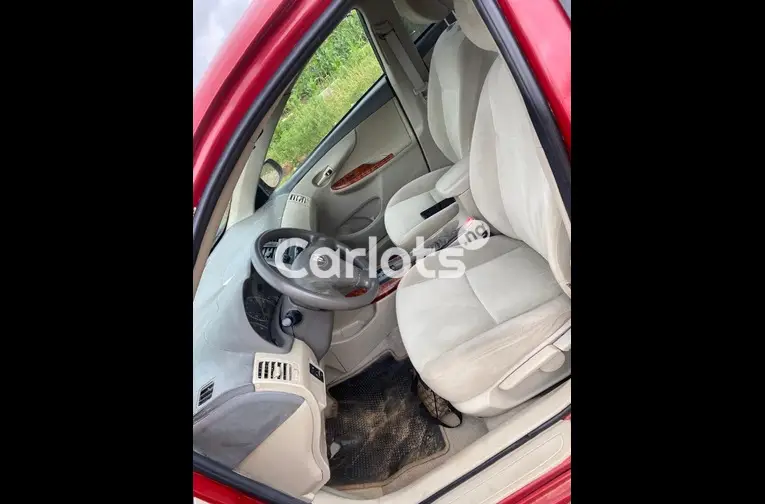 Nigerian Used 2010 TOYOTA COROLLA for sale in Abuja, FCT - photo 2 of 5