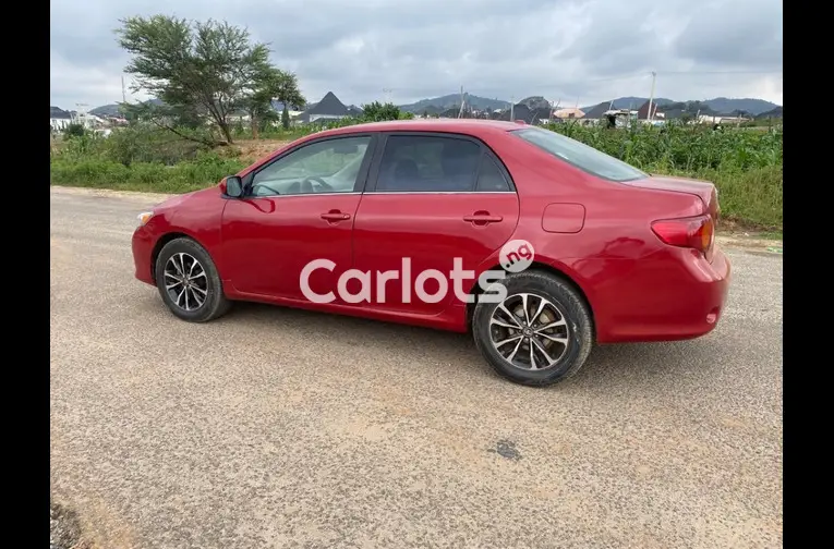 Nigerian Used 2010 TOYOTA COROLLA for sale in Abuja, FCT - photo 3 of 5