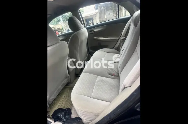 Nigerian Used 2010 TOYOTA COROLLA for sale in Abuja, FCT - photo 3 of 5