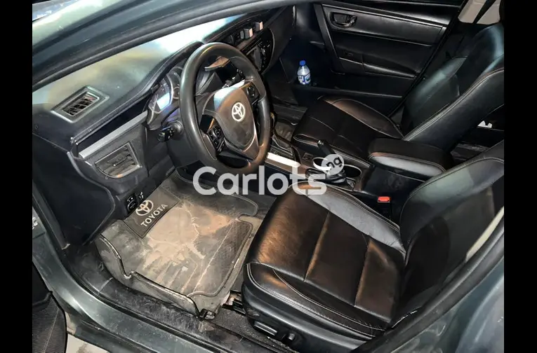 Nigerian Used 2014 Toyota Corolla With very sound engine for sale in Abuja, FCT - photo 4 of 5