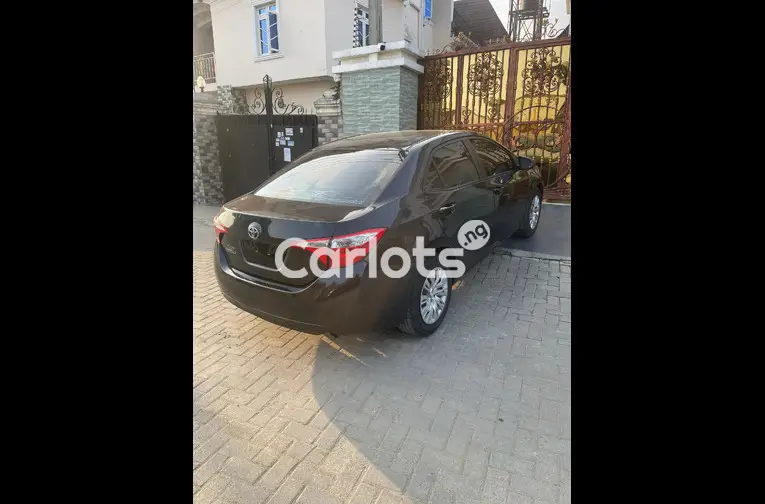 Nigerian Used FEW MONTHS REGISTERED 2015 TOYOTA COROLLA LE for sale in Amuwo Odofin, Lagos - photo 5 of 7