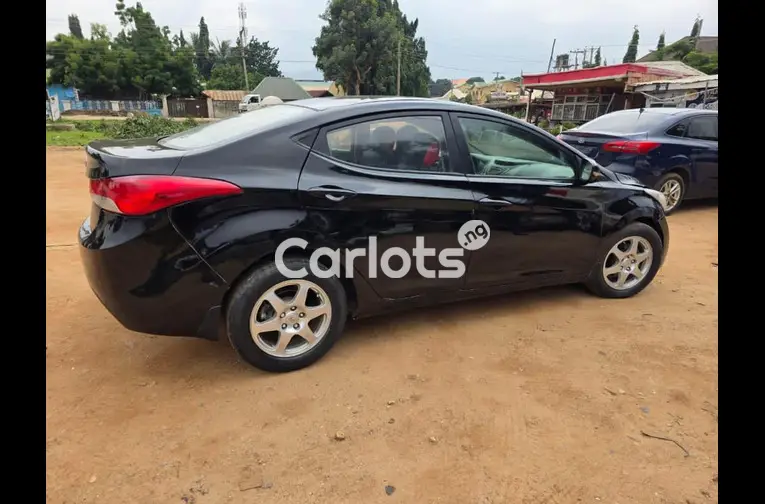 Nigerian Used 2013 HYUNDAI ELANTRA for sale in Abuja, FCT - photo 5 of 6