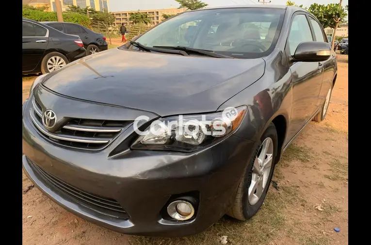 Nigerian Used 2013 TOYOTA COROLLA LE for sale in Abuja, FCT - photo 2 of 7