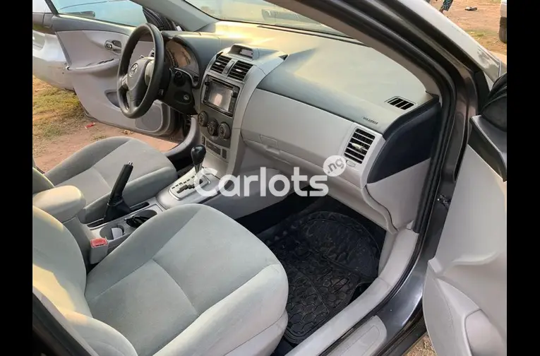 Nigerian Used 2013 TOYOTA COROLLA LE for sale in Abuja, FCT - thumbnail 3