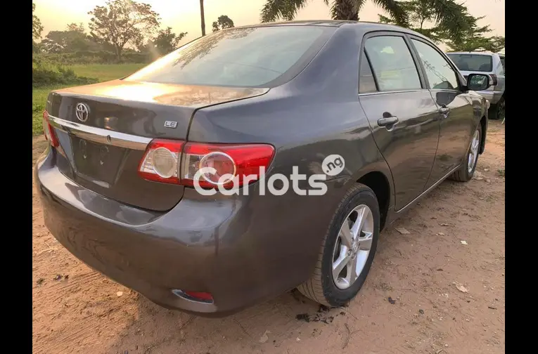 Nigerian Used 2013 TOYOTA COROLLA LE for sale in Abuja, FCT - photo 6 of 7