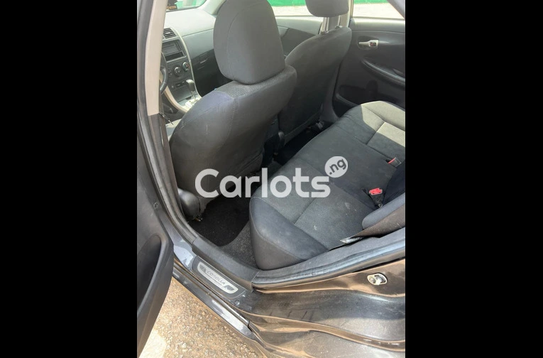 Nigerian Used Cheap Toyota Corolla 2009 for sale in Iyana Ipaja, Lagos - photo 7 of 7