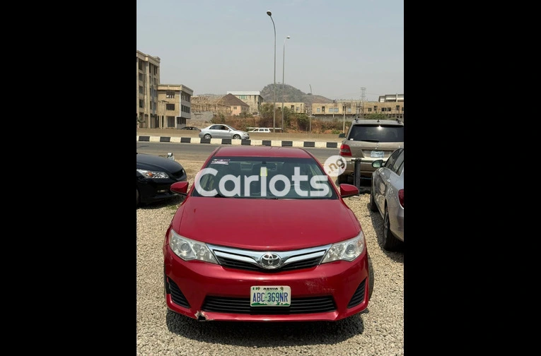 2013 TOYOTA CAMRY WITH A CLEAR DUTY