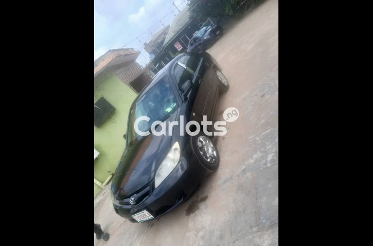 Nigerian Used UBER STANDARD 2004 HONDA CIVIC for sale in Ifako Ijaiye, Lagos - photo 5 of 7