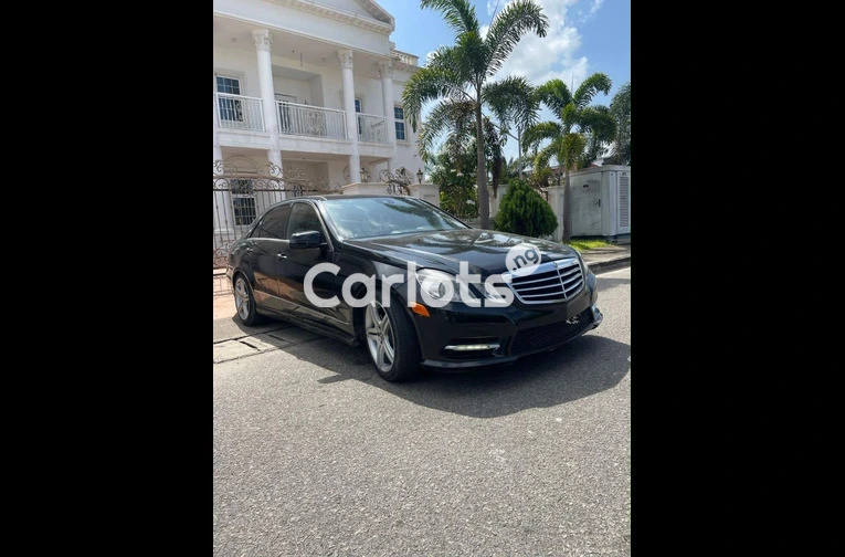 PRE-OWNED 2011 MERCEDES BENZ E550 4MATIC FULL OPTION