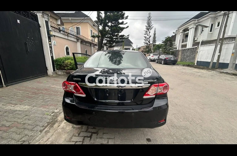 Foreign Used Toyota Corolla 2012 Black for sale in Festac, Lagos - photo 2 of 7