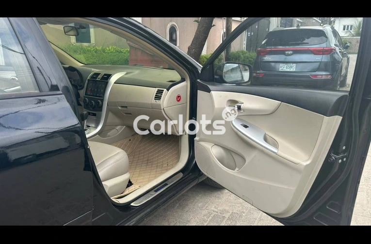 Foreign Used Toyota Corolla 2012 Black for sale in Festac, Lagos - photo 4 of 7