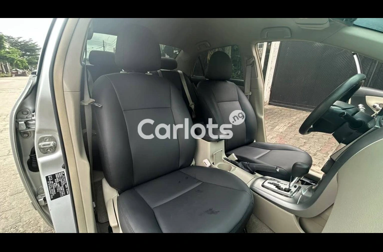 Foreign Used Toyota Corolla 2012 Silver for sale in Festac, Lagos - photo 1 of 6