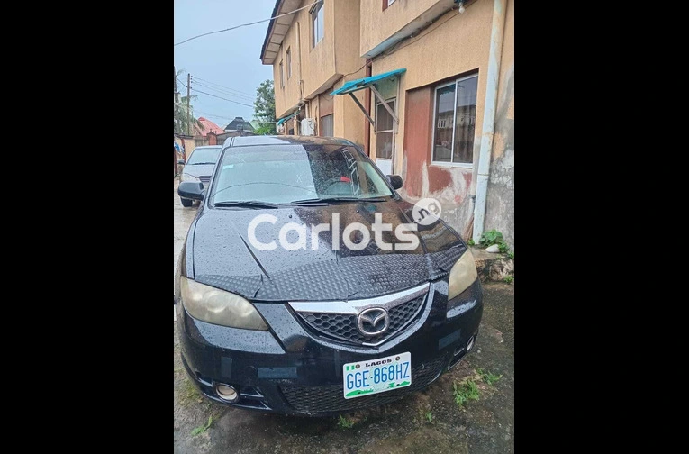 Nigerian Used Mazda MAZDA3 2004 Black for sale in Ikotun, Lagos - photo 1 of 7