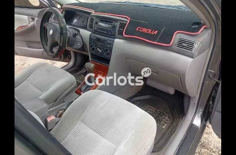 Nigerian Used Toyota Corolla 2005 Gray for sale in Ibadan, Oyo - photo 5 of 7