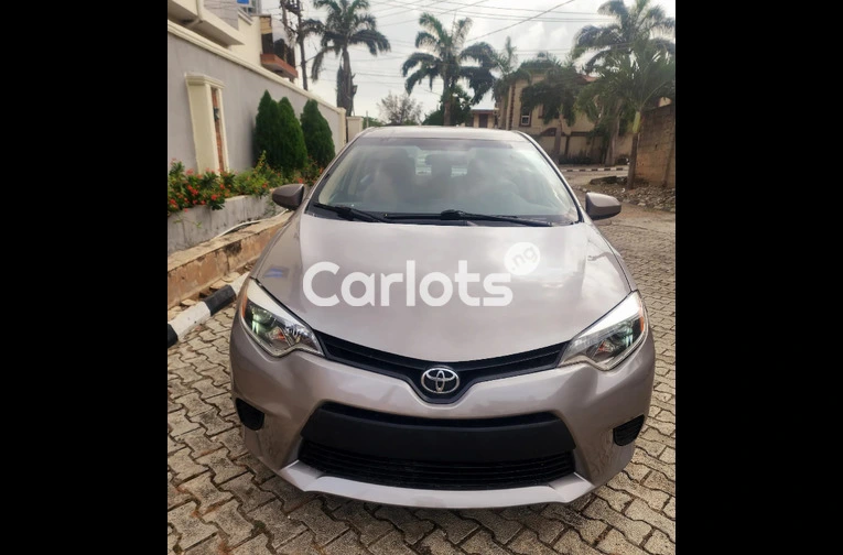 Clean Foreign-Used 2014 Toyota Corolla LE – Gold (Buy and Drive)