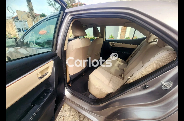 Clean Foreign-Used 2014 Toyota Corolla LE – Gold (Buy and Drive) for sale in Ikeja, Lagos - thumbnail 3