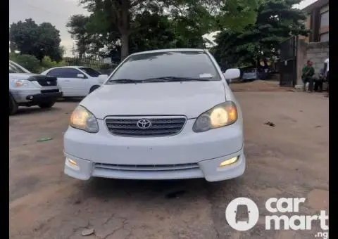 Toks 2005 Toyota Corolla Sports ..white - 1/5